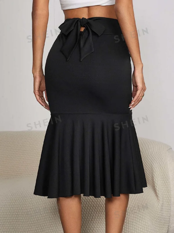 Sheer mesh skirt with lining for a trendy and modest styleSXY Tie Back Mermaid Hem Skirt