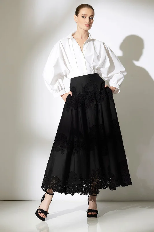 Tiered linen skirt for a bohemian summer festivalMadeira Cutwork Embroidered Maxi Skirt