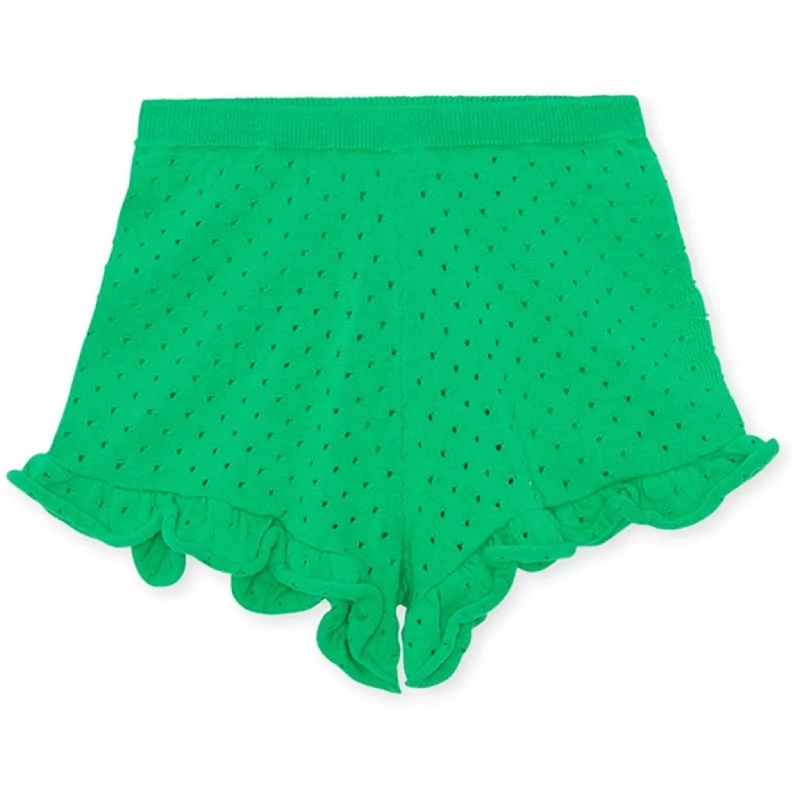 High - Waisted Women Shorts for a Retro and Flattering LookKonges Sløjd Cypres Frill Kelly Green Shorts
