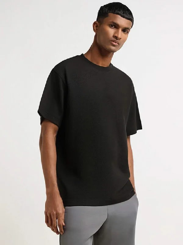 Belted Women Shorts to Enhance the WaistlineStudiofit Black Self Pattern Cotton Blend Relaxed Fit T-Shirt