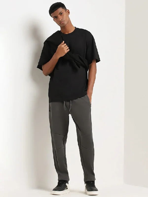 Stretchable Women Shorts for Maximum MobilityStudiofit Grey Solid Relaxed Fit Track Pants