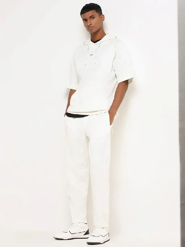 Belted Women Shorts to Enhance the WaistlineStudiofit White Relaxed Fit Track Pants