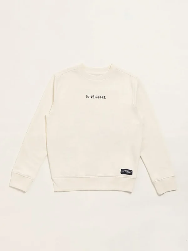 Plus Size Women Shorts with a Comfortable and Stylish FitY&F Kids Off White Printed Sweatshirt